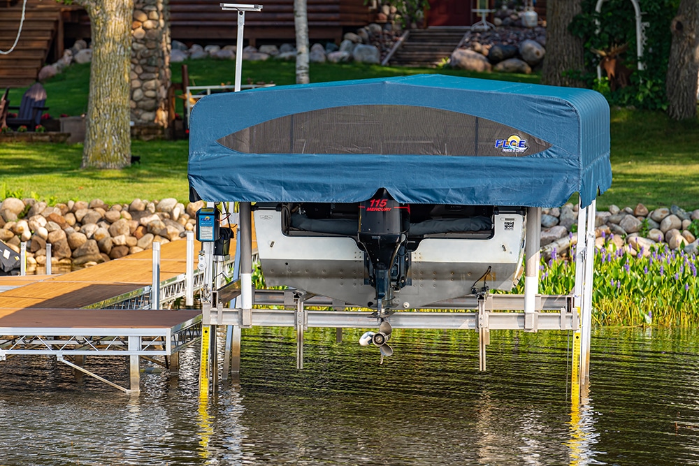 FLOE vertical boat lift with canopy and guide-ins for recreational boat